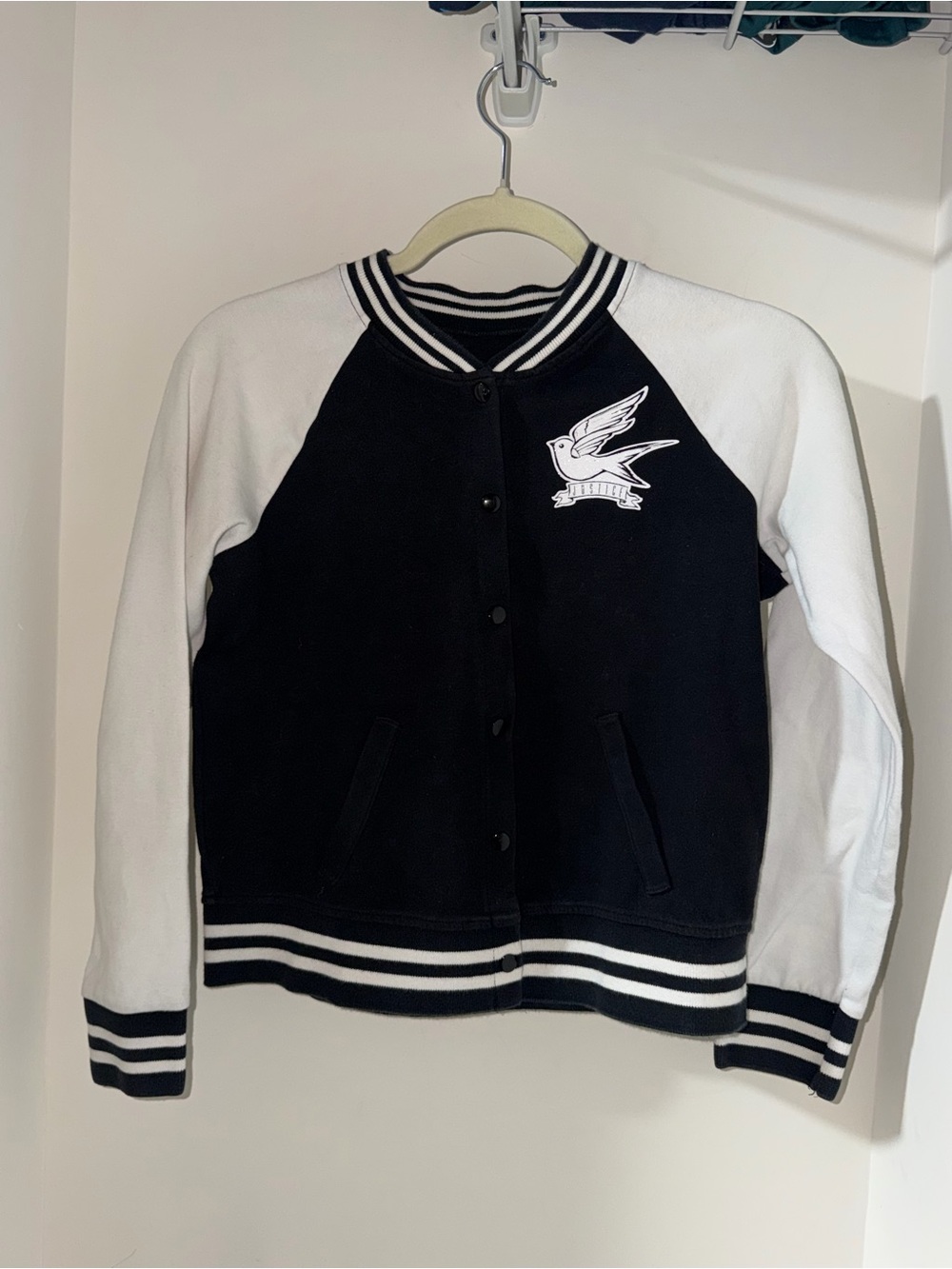 Girls Justice Black and White Varsity Jacket with Bird Patch